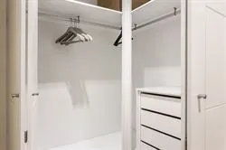 empty shelves in the closet wardrobe for clothes